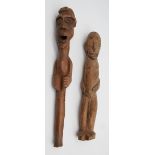 2 figures. Probably West Africa. Liberia, Ivory Coast. Pole and figure?