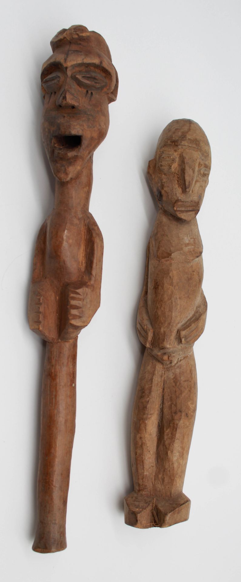 2 figures. Probably West Africa. Liberia, Ivory Coast. Pole and figure?