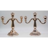 A pair of candlesticks. Silver 835.