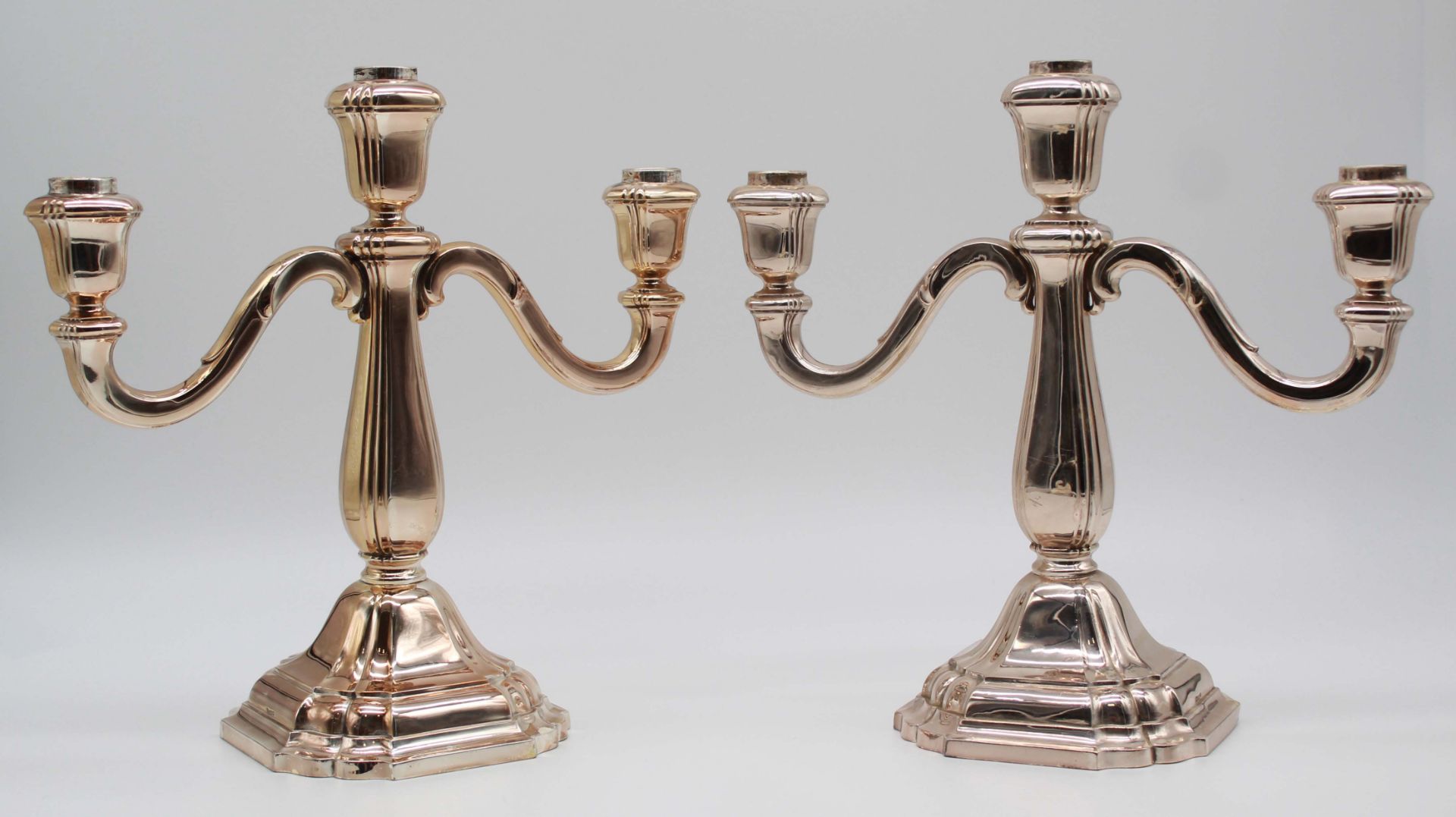 A pair of candlesticks. Silver 835.