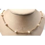 Necklace. Yellow gold 750 with cultured pearls. Gross 27.1 grams.