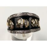 Ring 585 gold. Elephants with diamonds. 7.9 grams.