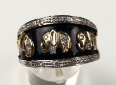 Ring 585 gold. Elephants with diamonds. 7.9 grams.