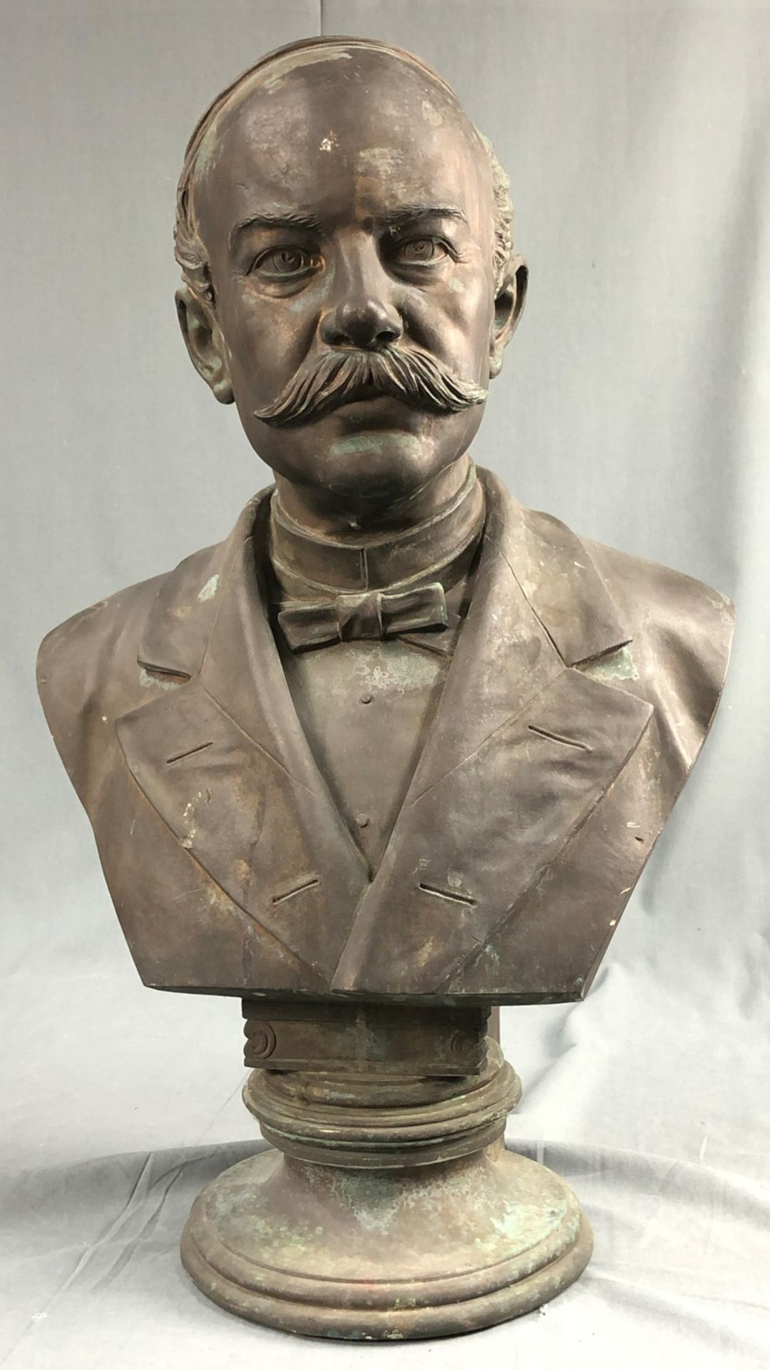 A. E. RUMPF (XIX). Bust of a gentleman. Bronze. '' 1886 ''.