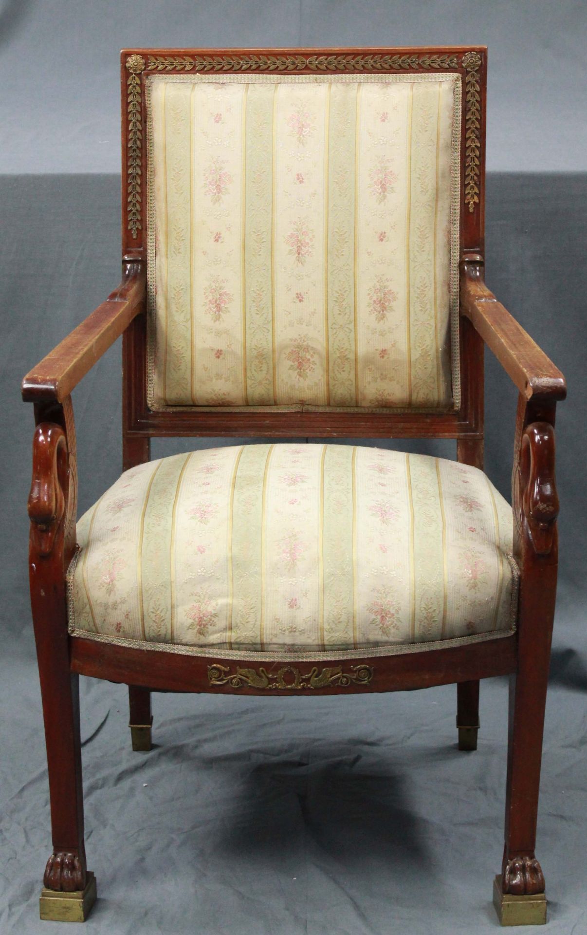 Empire armchair. Bergere. With bronze d'oré elements.