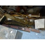 A good collection of vintage tools including large saws, wooden woodworking chest containing