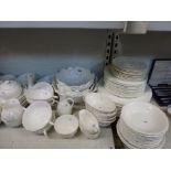 A large quantity of Coalport Country Ware tea and dinner wares including meat plates, tureens,