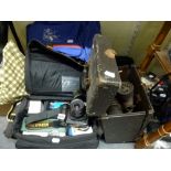 A quantity of camera equipment including a Nikon D100 camera, camera bags, a cased tripod, a vintage