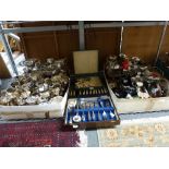 A very large collection of silver-plated golfing trophies in two cartons, together with two cases of