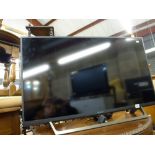 A Sony Bravia Smart television with remote control. [on lot 879] TO BID ON THIS LOT AND FOR