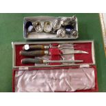 Seven various English silver condiments, including one with loaded base, an 1837 silver sugar tongs,