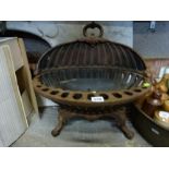 A 19th century cast iron fire grate. [under G22] TO BID ON THIS LOT AND FOR VIEWING APPOINTMENTS