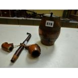 A Victorian novelty string box in wood and brass simulating a spirit barrel, together with a late