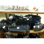 A large quantity of cameras, camera equipment and video cameras including three Nikon cameras: