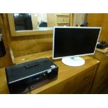 A JVC DAB Blue Tooth Radio and CD Player, a Samsung Monitor, a desk light and a Samsung Blu Ray