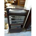 A Sony stacking hi-fi in cabinet, comprising stereo turntable system PS-LX20, FM stereo tuner ST-