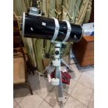 A Newtonian Reflector Telescope (114 mm x 135 mm x 203 mm), with stand TO BID ON THIS LOT AND FOR