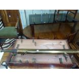 A brass telescope, 124 cm extended, in wooden Clarkson's London case [on 919] TO BID ON THIS LOT AND