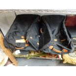 Two Brics black nylon pull-along suitcases with tan leather trim, 19 x 30 x 10 in [upstairs shelves]