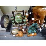 A large carved elephant figure, an Oriental carved cork montage, a sherry flask and cups, an onyx