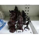 A set of eight composite figurines of Japanese warriors and ten small metal Indian figurines [s50]