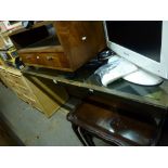 A stylish 1970s hall table, the glass top in a copper frame on chromed pedestal, and a wooden