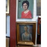 An oils on canvas portrait of a young woman (44 x 33 cm), indistinctly signed, gilt frame,