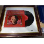 A framed 'The King and I' LP record with Yul Brynner signature [upstairs shelves] TO BID ON THIS LOT