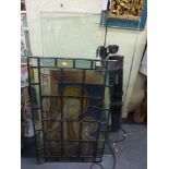 A vintage stained glass panel depicting the Madonna and child 23 in x 37 in TO BID ON THIS LOT AND