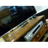 A Samsung Smart television and a Phillips DVD player. [on lot 873] TO BID ON THIS LOT AND FOR