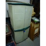 A useful plastic garden cupboard and contents of tools and fertilizers. TO BID ON THIS LOT AND FOR