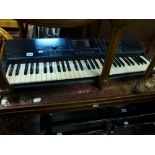 A Yamaha PSR230 Keyboard on stand. [on lot 879] TO BID ON THIS LOT AND FOR VIEWING APPOINTMENTS