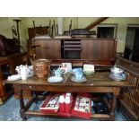 An antique and later oak refectory style of table the three plank top on substantial turned