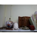 A large Oriental Imari ginger jar and cover converted to a table lamp, a carved wooden table screen,