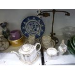 Nine antique tea bowls with six matching saucers, a teapot on stand and plate, two further antique
