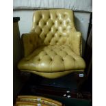 A good armchair upholstered in buttoned cream leather on carved cabriole legs. TO BID ON THIS LOT