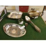 English silver, comprising a late Victorian sugar basin in Regency style, an oval dish, napkin