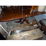 A substantial 19th century mahogany breakfast table, the rectangular tilting top on a turned