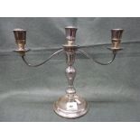 An Elizabeth II silver three-light candelabrum, with detachable branches and filled base, 9.75 in,