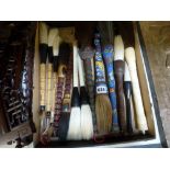 A collection of 13 various Oriental calligraphy brushes in various materials, including cloisonné