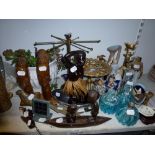 A mixed lot including a pair of African carved wooden busts and figurines, blue Venetian glass
