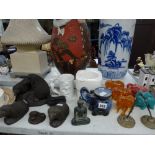 A mixed lot including a collection of elephant figurines including incense burners, four hedgehog