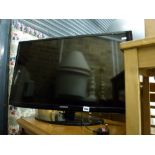 A Samsung flat screen television on stand. [on lot 904] TO BID ON THIS LOT AND FOR VIEWING