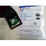 A 1688 carats oval shaped emerald, with American GLA certificate, in presentation box TO BID ON THIS