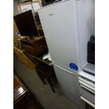 A Candy fridge freezer and a Prem-I-Air fan. TO BID ON THIS LOT AND FOR VIEWING APPOINTMENTS CONTACT