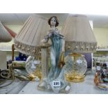 An Oriental blue and white stick stand, a large Oriental vase, a large stylish modern table lamp,