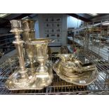 A quantity of silver-plated items, including a tall Regency-style candlestick, two large vases, a