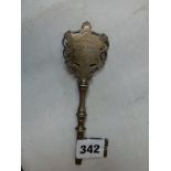 A silver ceremonial key inscribed to 'Sir G.W. Kekewich on the occasion of the opening of the Girls'
