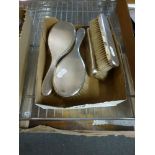 An engine-turned silver set of two hairbrushes and two clothes brushes, London 1950 TO BID ON THIS