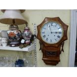 A late 19th century American wall clock in decorative walnut and marquetry case; together with a